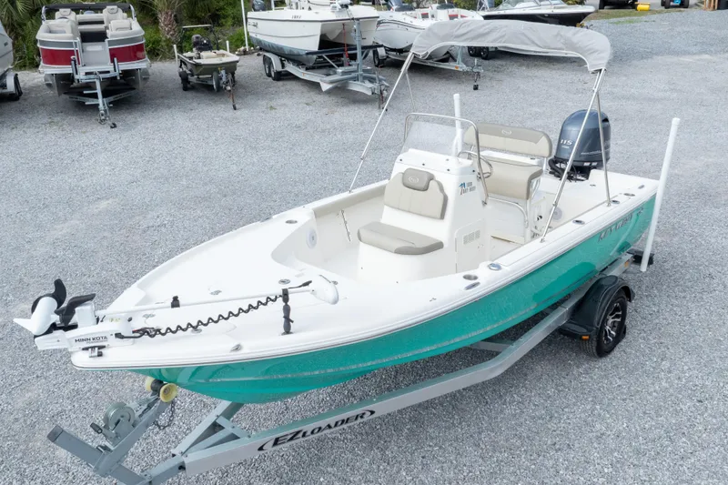 Slide: The Image of 2023 Key West 188 Bay Reef boat on trailer, featuring Minn Kota trolling motor. - 38