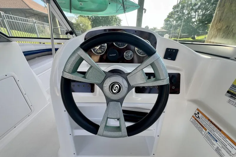 Slide: The Image of Steering wheel and dashboard of 2013 Hurricane SunDeck 187 OB boat. - 24
