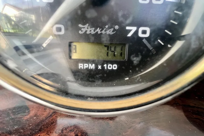 Slide: The Image of Close-up of a 2013 Hurricane SunDeck 187 OB tachometer displaying 741 RPM. - 48