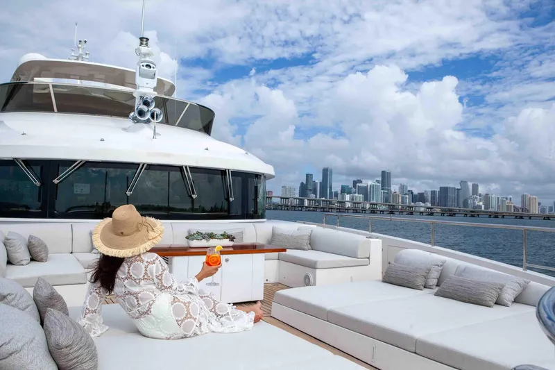 Slide: The Image of Luxury yacht Benetti Classic Supreme 132, 2012, with city skyline view. - 15