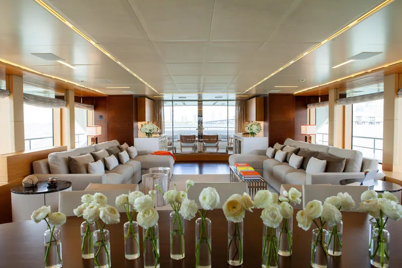 Slide: The Image of Luxurious interior of 2012 Benetti Classic Supreme 132 yacht with elegant seating and floral decor. - 23