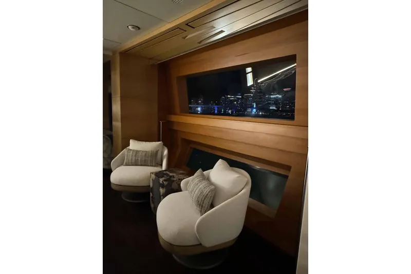 Slide: The Image of Luxurious interior of 2012 Benetti Classic Supreme 132 yacht with city skyline view. - 31