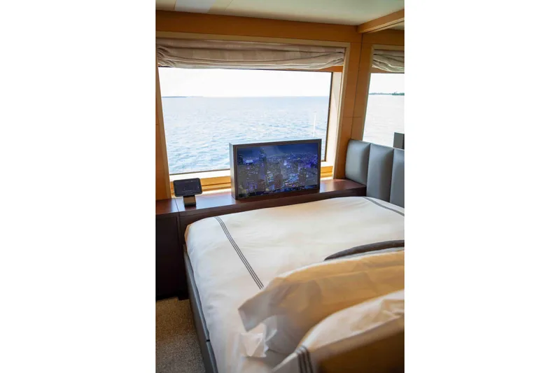 Slide: The Image of Luxurious bedroom view on 2012 Benetti Classic Supreme 132 yacht, featuring ocean scenery. - 32