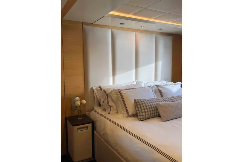 Slide: The Image of Luxurious bedroom interior on 2012 Benetti Classic Supreme 132 yacht, featuring elegant bedding and decor. - 34