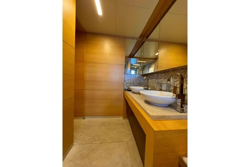 Slide: The Image of Luxurious bathroom on 2012 Benetti Classic Supreme 132 yacht with modern fixtures and wood accents. - 36