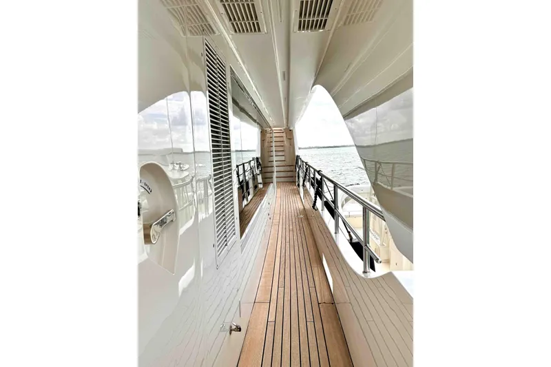 Slide: The Image of Side deck view of 2012 Benetti Classic Supreme 132 yacht, featuring sleek design and ocean backdrop. - 39