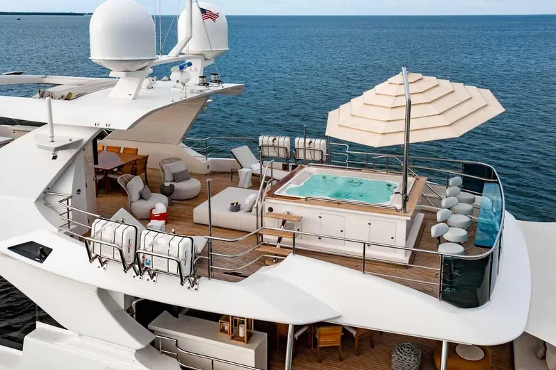 Slide: The Image of Luxurious 2012 Benetti Classic Supreme 132 yacht with jacuzzi and elegant deck seating. - 4