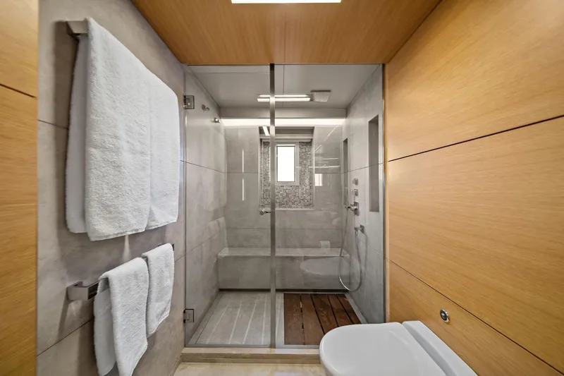 Slide: The Image of Luxurious bathroom on 2012 Benetti Classic Supreme 132 yacht with modern shower and wooden accents. - 46