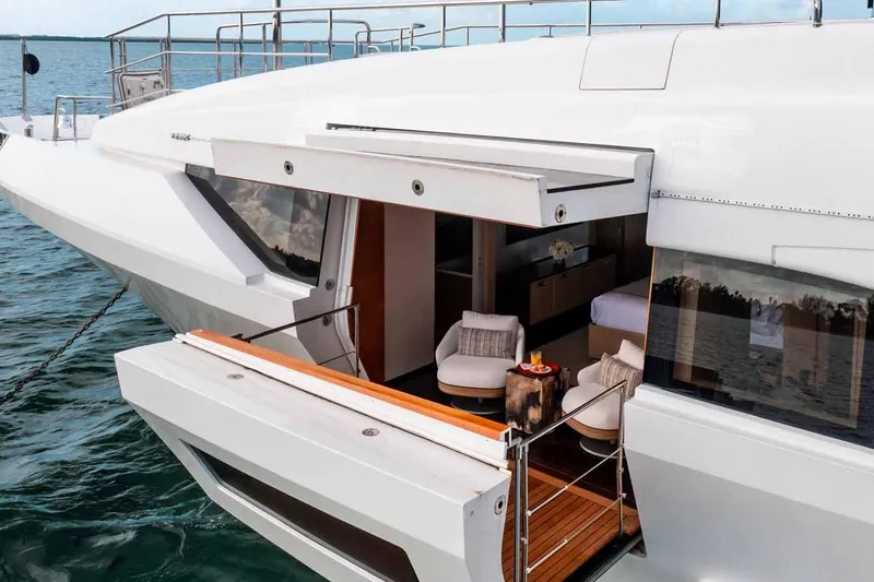 Slide: The Image of Luxurious Benetti Classic Supreme 132 yacht with open deck, elegant seating, and ocean view. - 6