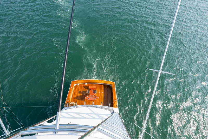 Slide: The Image of Aerial view of 2005 Viking Convertible yacht on open water. - 14
