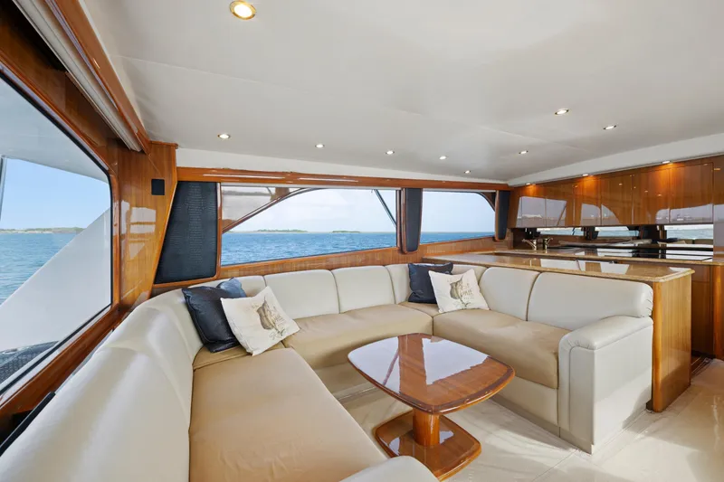 Slide: The Image of Luxurious interior of a 2005 Viking Convertible yacht with elegant seating and ocean view. - 21