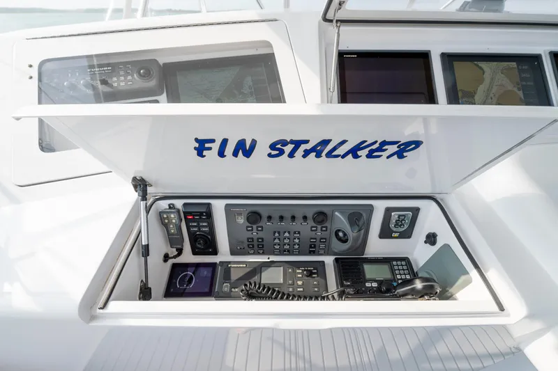 Slide: The Image of Control panel of 2005 Viking Convertible yacht "Fin Stalker" with navigation equipment. - 5