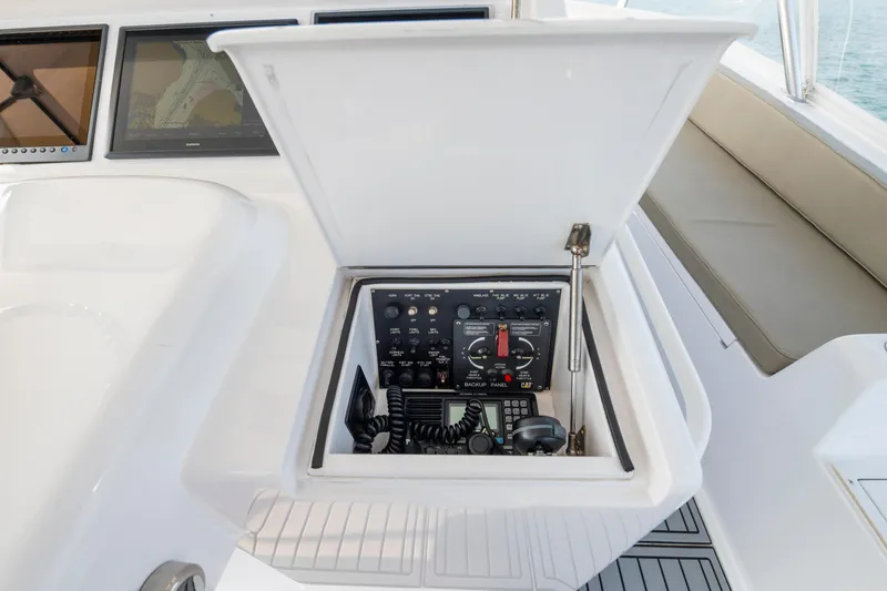 Slide: The Image of Control panel on a 2005 Viking Convertible yacht with navigation screens. - 6