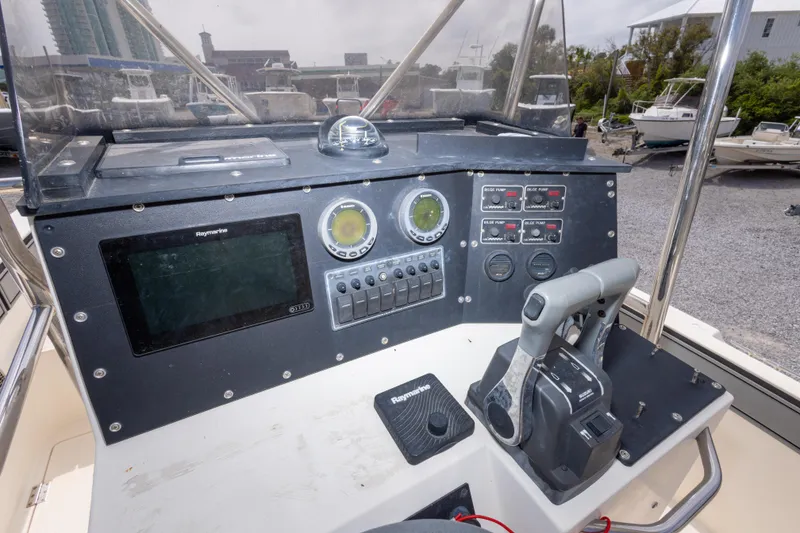Slide: The Image of Control panel of a 1997 Sea Cat SL5 boat with navigation equipment. - 22
