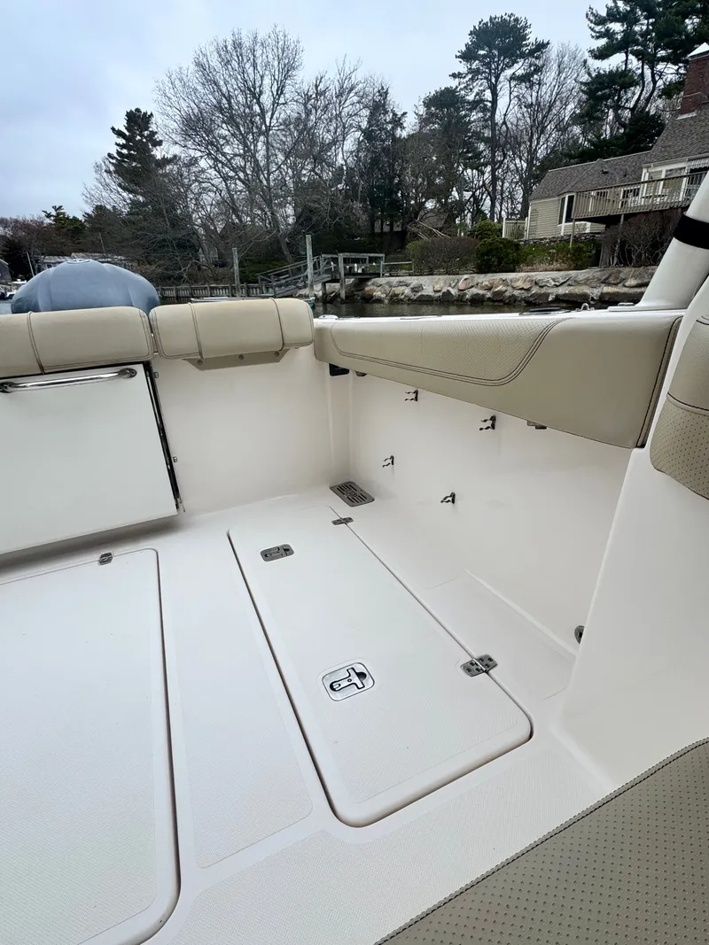 Slide: The Image of Interior of a 2017 Pursuit DC 295 Dual Console boat. - 3