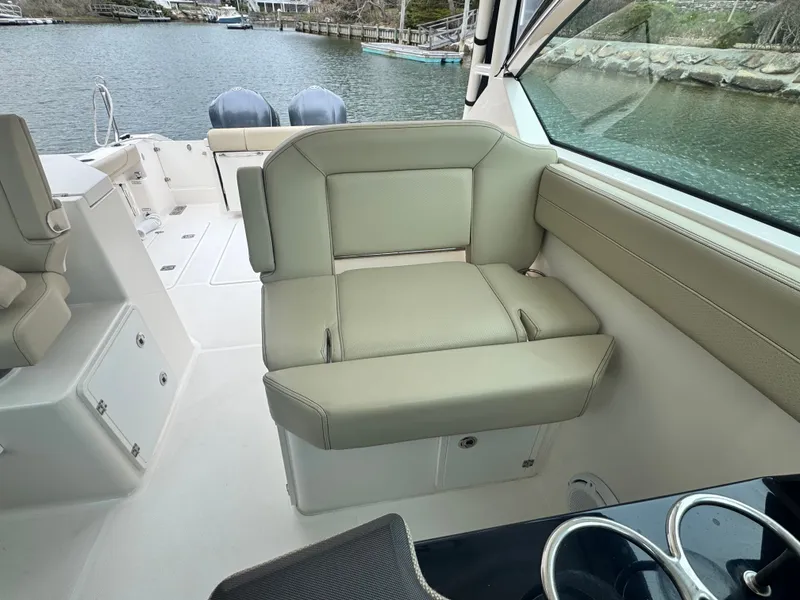 Slide: The Image of Interior of a 2017 Pursuit DC 295 Dual Console boat. - 7
