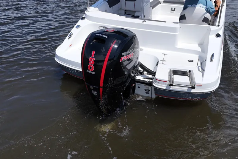 Slide: The Image of Tahoe 1950 boat with Mercury 150 Pro outboard motor on water, 2022 model. - 12