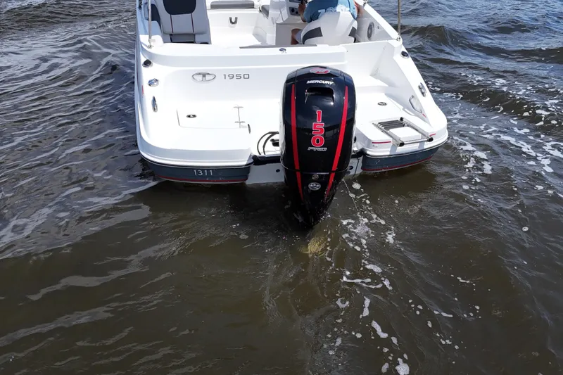 Slide: The Image of Tahoe 1950 boat with Mercury 150 engine on water, 2022 model. - 13