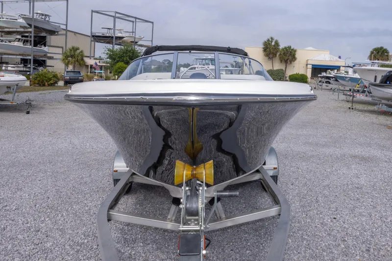 Slide: The Image of Front view of a 2022 Key West 203 DFS boat on a trailer. - 18