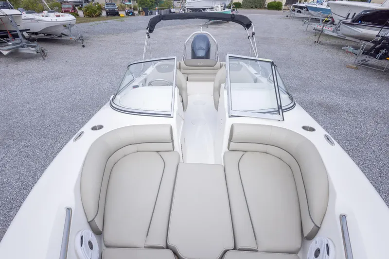Slide: The Image of 2022 Key West 203 DFS boat interior with spacious seating and open deck layout. - 29