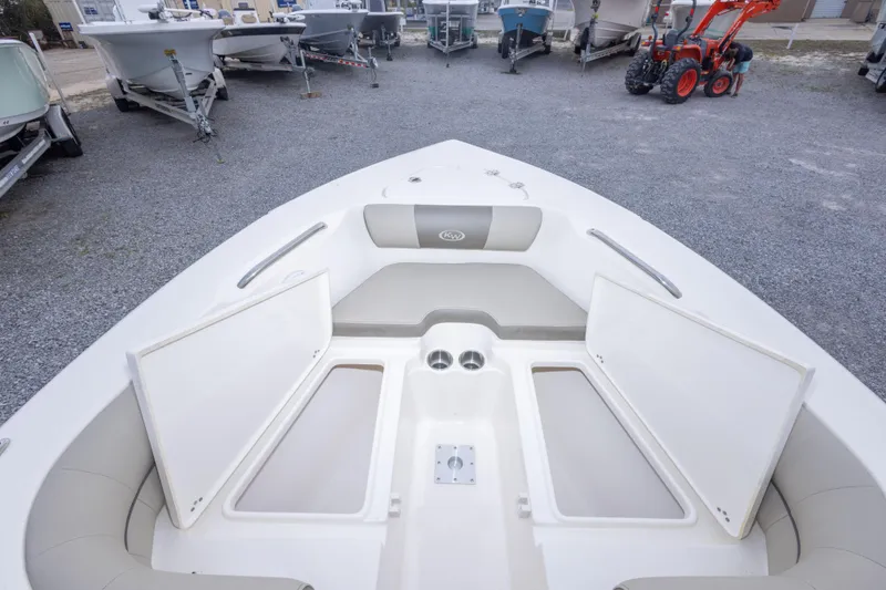 Slide: The Image of 2022 Key West 203 DFS boat interior with open storage compartments. - 31