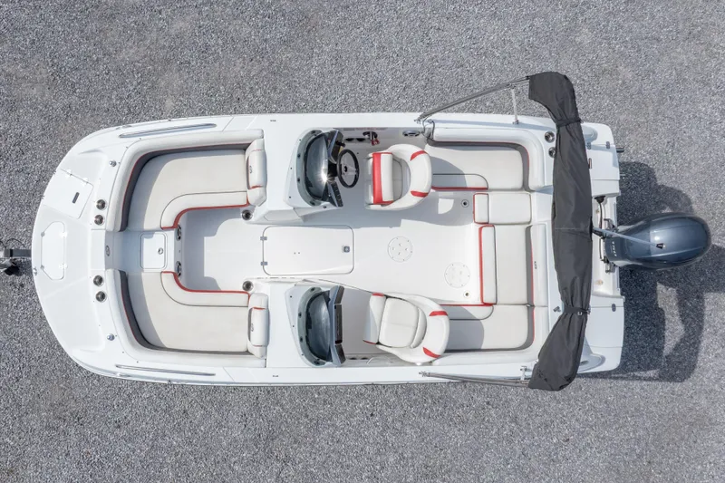 Slide: The Image of 2018 Hurricane SunDeck Sport 192 OB boat, aerial view, white and red seating, outboard motor. - 11