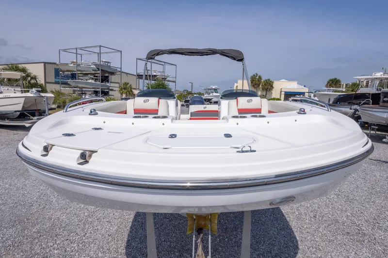Slide: The Image of 2018 Hurricane SunDeck Sport 192 OB boat displayed outdoors on gravel lot. - 14