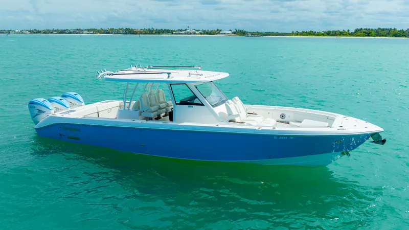 The Image of Everglades 395 Center Console 2022 on turquoise water. - 1