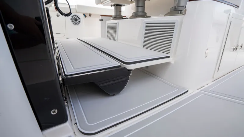 Slide: The Image of Everglades 395 Center Console 2022 with foldable seating area. - 11