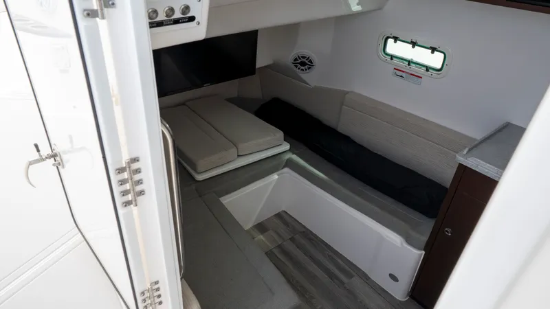 Slide: The Image of Interior of 2022 Everglades 395 Center Console with seating area. - 16