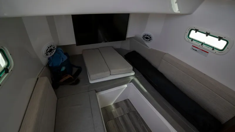 Slide: The Image of Interior of 2022 Everglades 395 Center Console with seating area. - 17