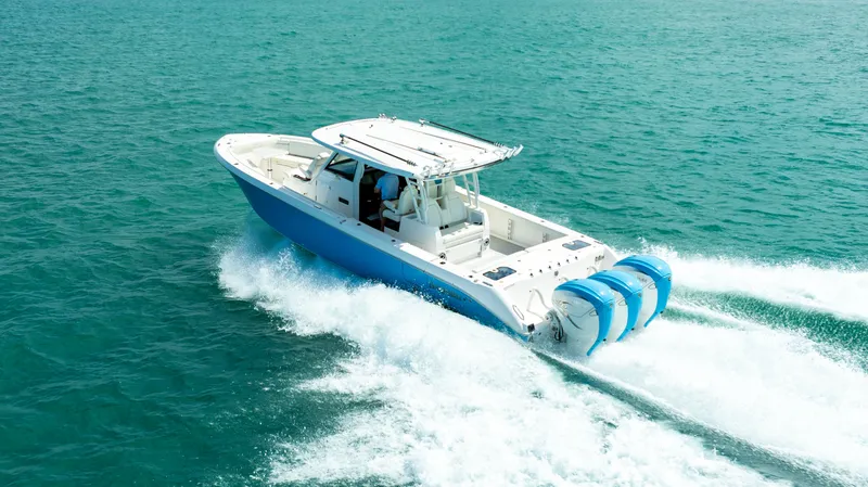Slide: The Image of 2022 Everglades 395 Center Console cruising on open water. - 21