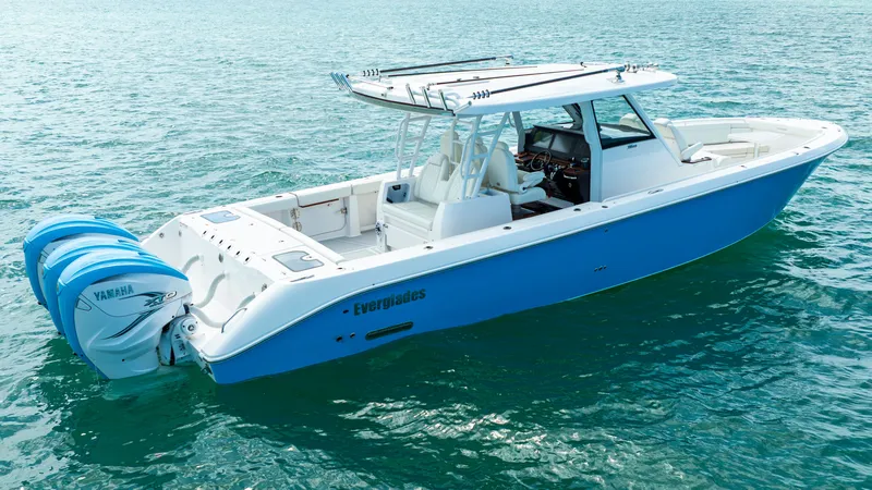 Slide: The Image of 2022 Everglades 395 Center Console boat on open water. - 23