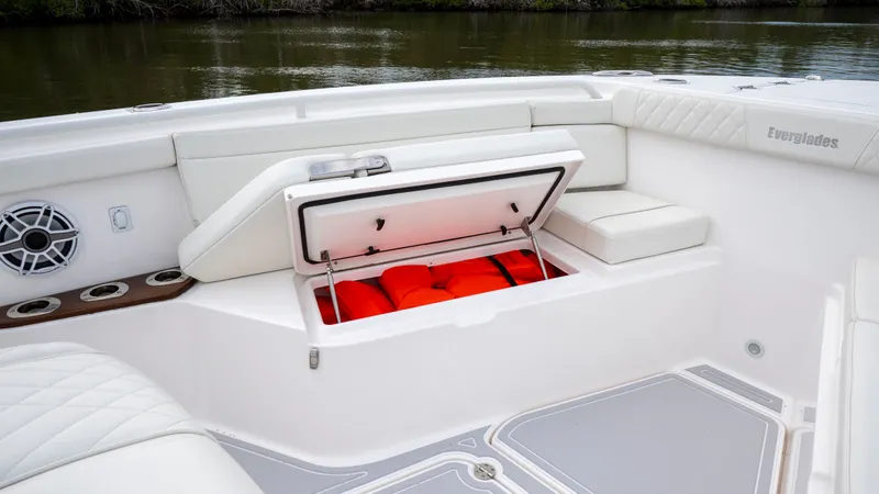 Slide: The Image of Everglades 395 Center Console 2022 with storage and seating area. - 31