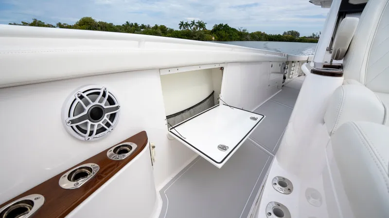 Slide: The Image of Everglades 395 Center Console 2022 with speaker and storage compartment. - 36