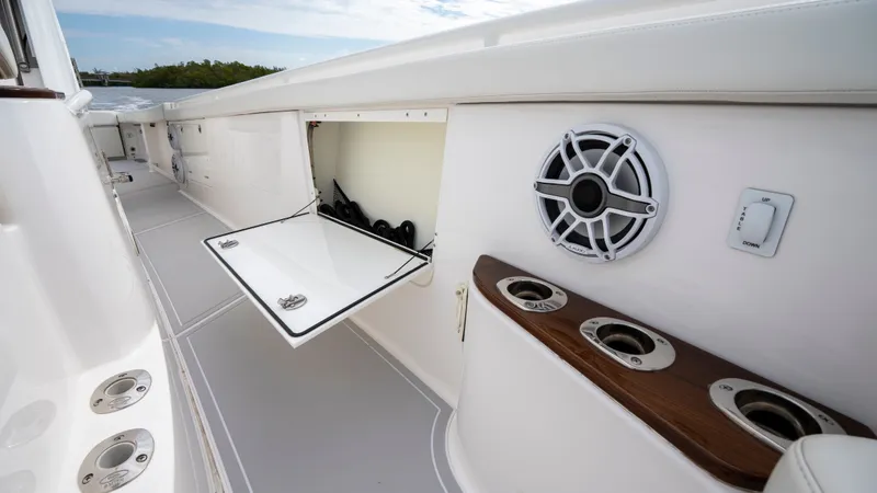 Slide: The Image of Everglades 395 Center Console 2022 with speaker and storage compartment. - 37