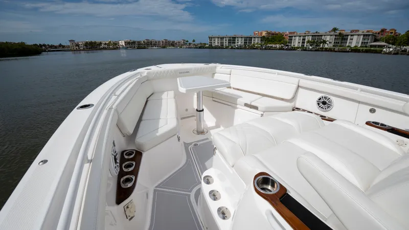 Slide: The Image of Luxurious interior of Everglades 395 Center Console 2022 on calm waters. - 40
