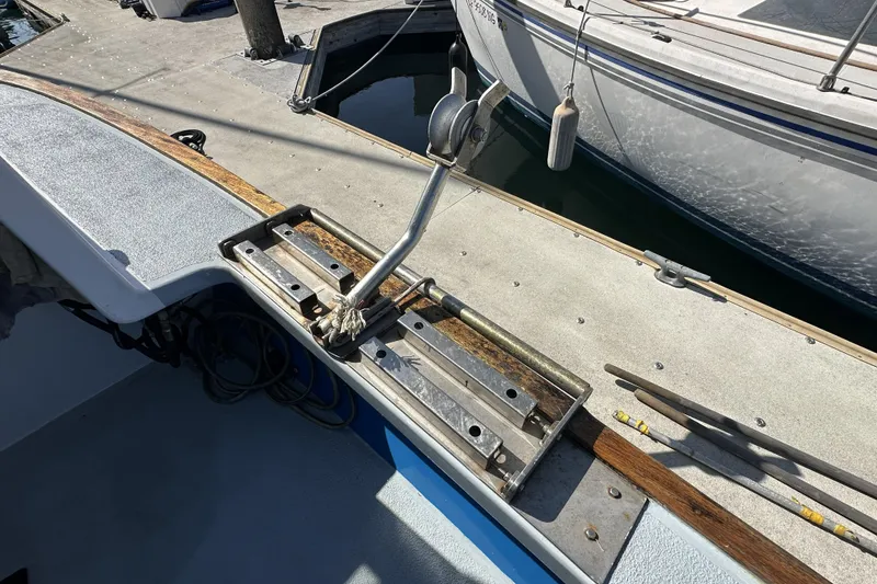 Slide: The Image of Sailboat deck with winch and cleat, Seeway 31, 1990 model, docked at marina. - 10