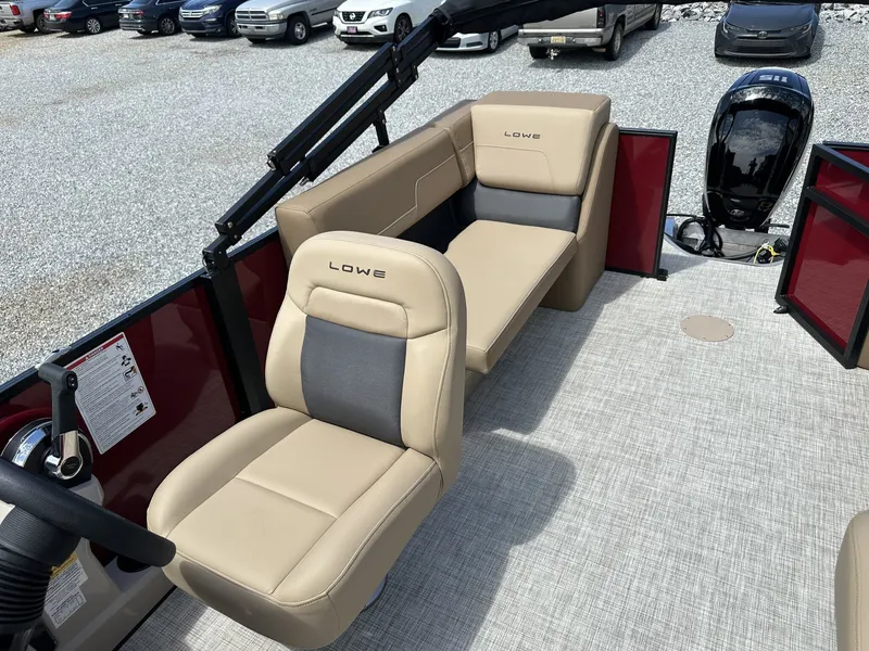 Slide: The Image of Interior of Lowe LS Walk Thru 210 boat, model year 2026. - 11