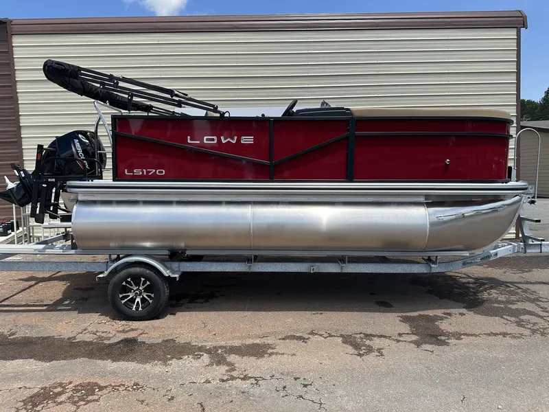 The Image of 2026 Lowe LS Walk Thru 170 pontoon boat on trailer. - 1