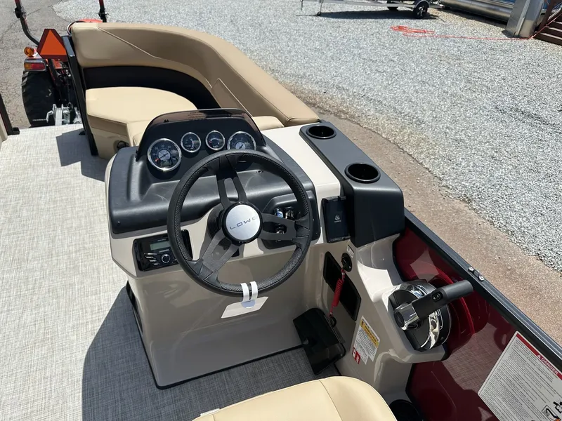 Slide: The Image of Interior view of 2026 Lowe LS Walk Thru 170 boat cockpit. - 8