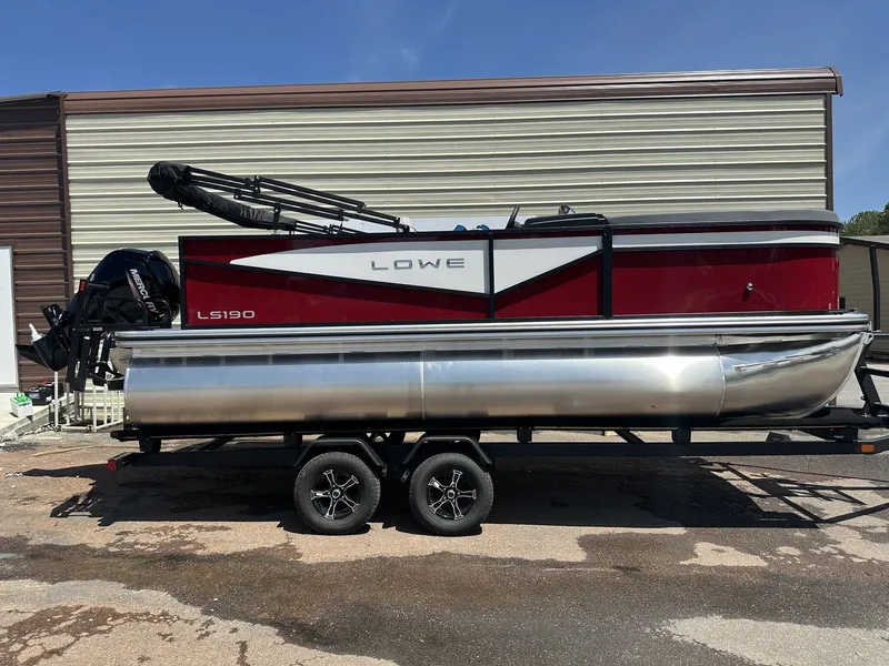 The Image of 2026 Lowe LS Walk Thru 190 pontoon boat on trailer. - 1