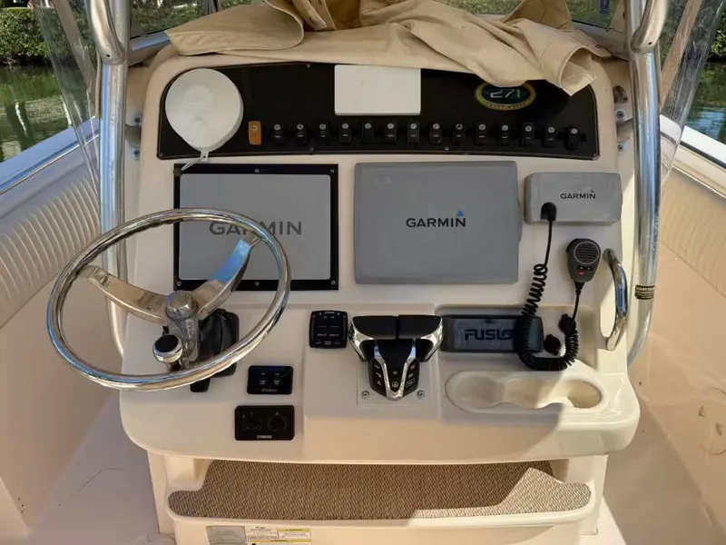 Slide: The Image of 2013 Grady-White Canyon 271 helm with Garmin electronics. - 10