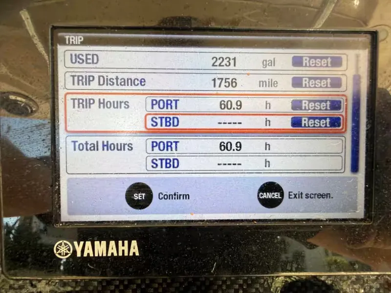 Slide: The Image of Yamaha display showing 2231 gallons and 1756 miles on Grady-White Canyon 271. - 11