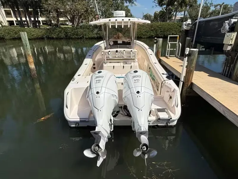 Slide: The Image of 2013 Grady-White Canyon 271 boat with twin outboard engines. - 3