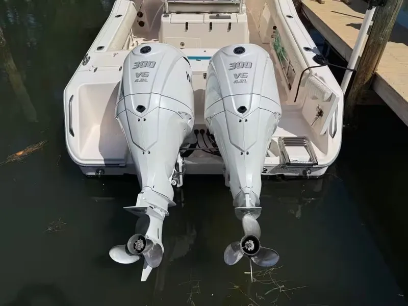 Slide: The Image of 2013 Grady-White Canyon 271 with twin 300 HP outboard engines. - 4