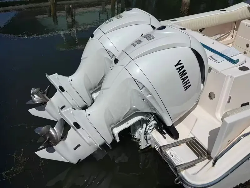 Slide: The Image of 2013 Grady-White Canyon 271 with Yamaha outboard engines. - 5