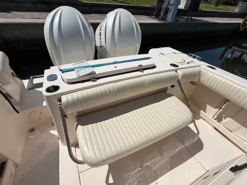 Slide: The Image of 2013 Grady-White Canyon 271 boat with seating and engines. - 7