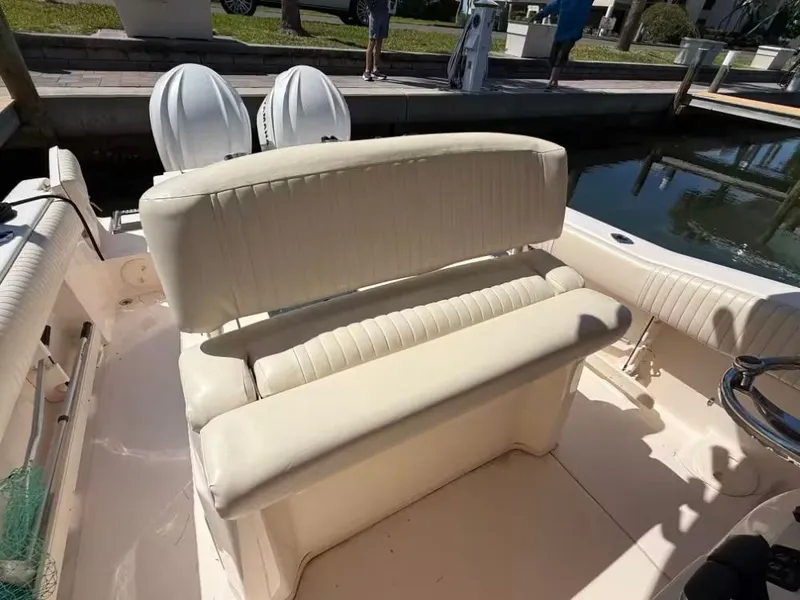 Slide: The Image of 2013 Grady-White Canyon 271 boat seating at dock. - 9