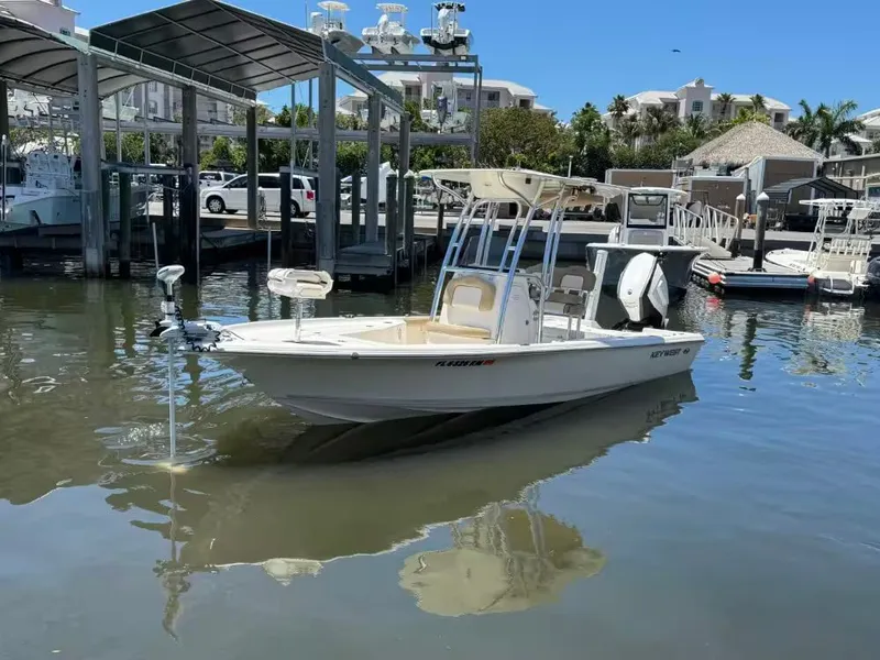 The Image of 2018 Key West 230 Bay Reef boat docked in marina. - 1